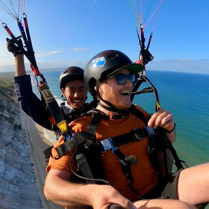 Tandem Paragliding With A Friend: 20 Min Tandem Paragliding & Neck Buffs