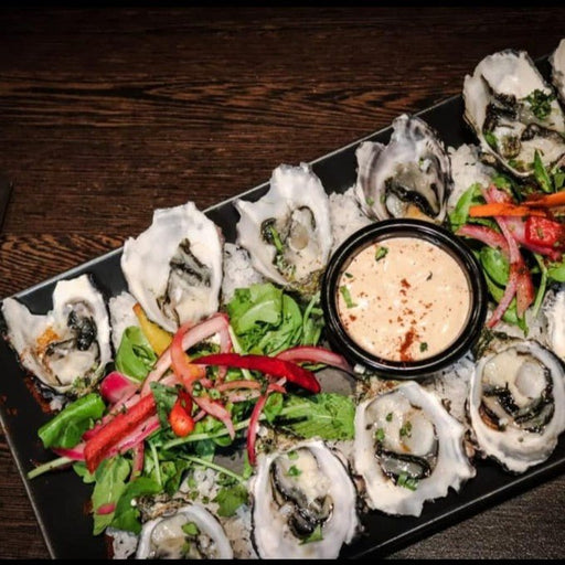 Experience Dinner At Secrets By The Sea - We Wander